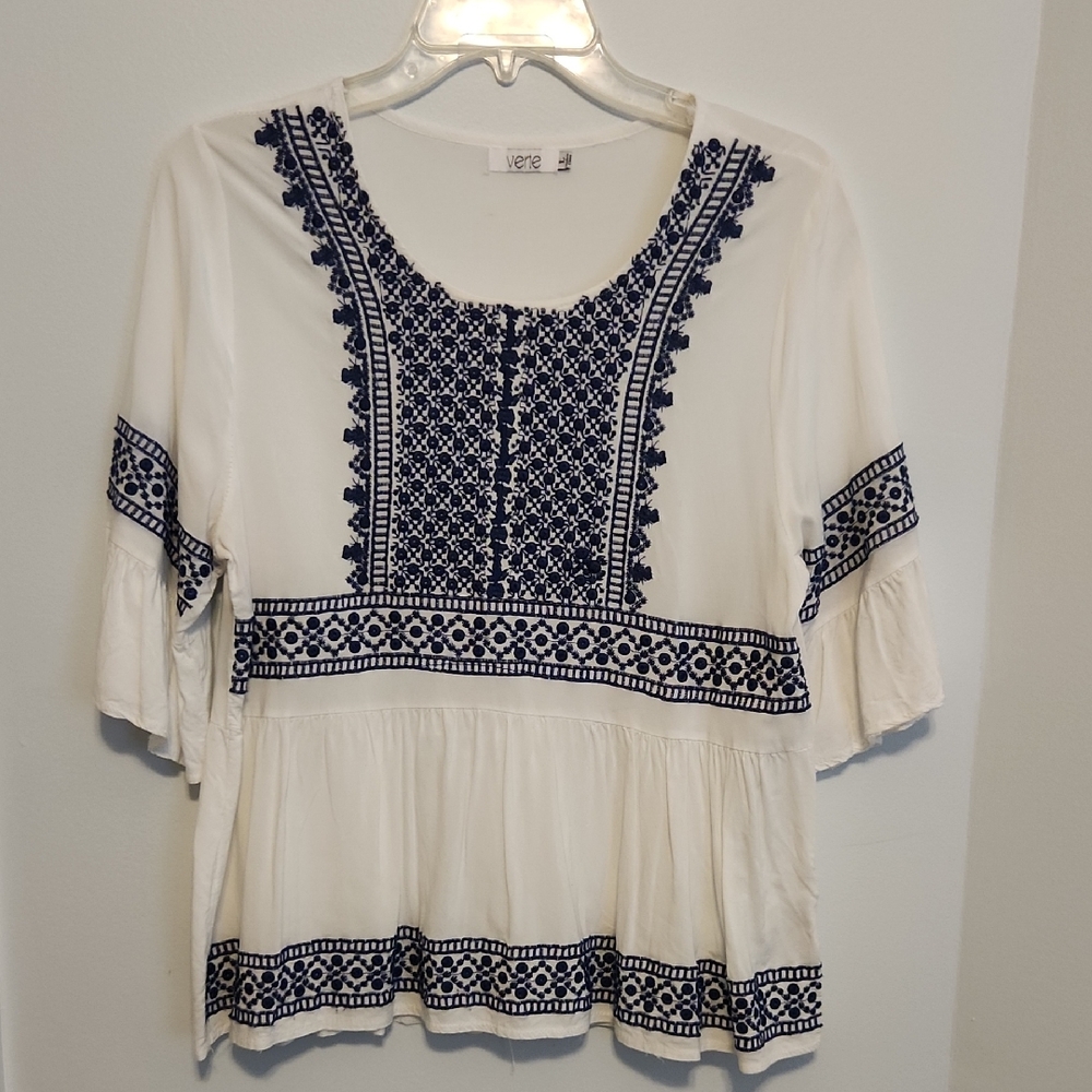 White Embellished Peplum Blouse with Ruffled Sleeves